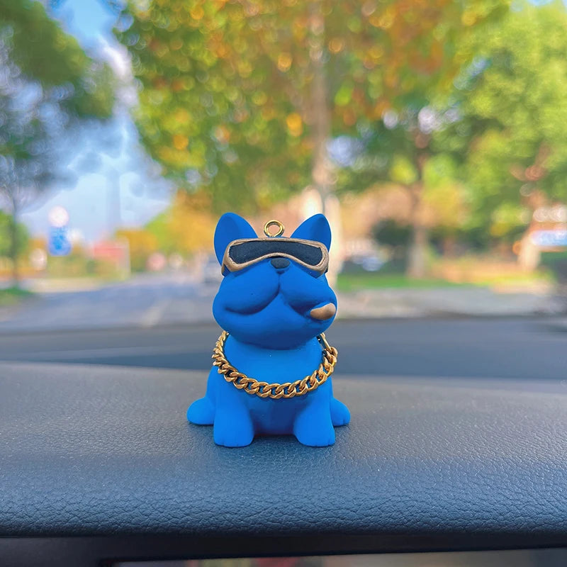 Bulldog ornament on car dashboard