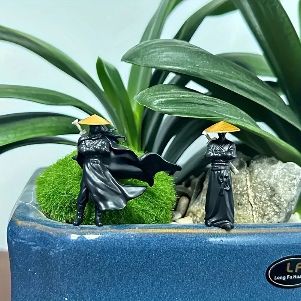 Samurai statues on car dashboard