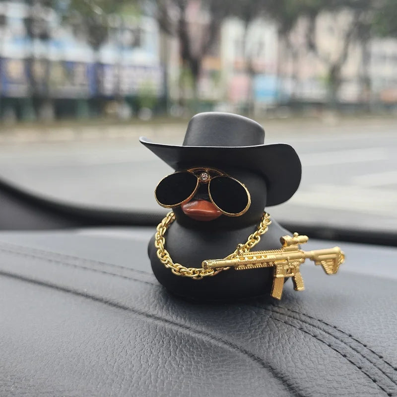 Cowboy rubber duck dashboard ornament with black hat, sunglasses, gold chain and gold rifle